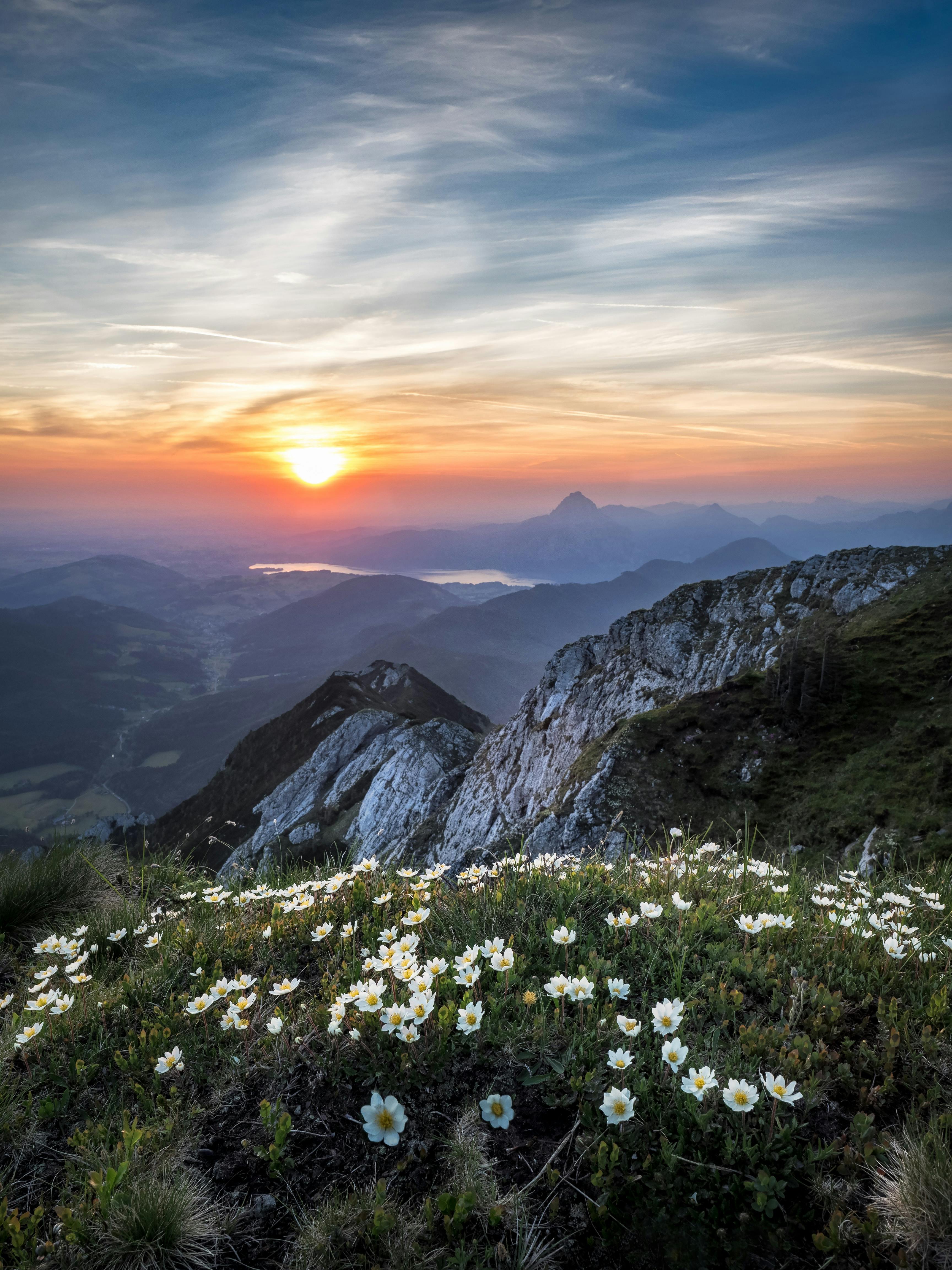 Warm mountain sunrise with layered peaks
